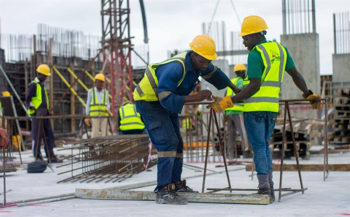 Engineers inspecting reinforcement on site